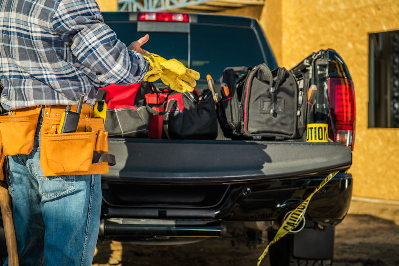 contractor with truckload of tools